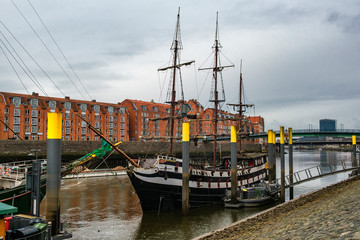Alexander von Humboldt tall ship and others wooden sailing ships and barg floating on the banks of...