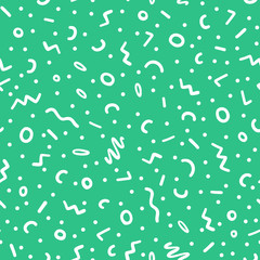 Hand drawn colorful abstract confetti seamless pattern. Pop art fashion festival abstract background in memphis style. Green color