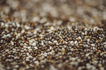 Close-up of raw, unprocessed, dried black chia seeds