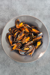 Mussel with white wine sauce on table