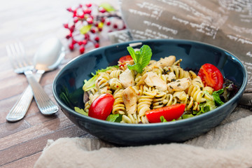 pasta and chicken on the table