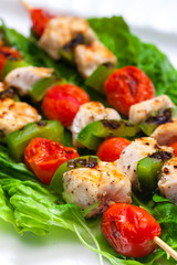 still life of meat skewers