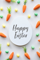 Easter message background with easter eggs and carrots