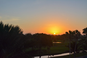 Sunrise over a Florida Gulf Coast - obrazy, fototapety, plakaty