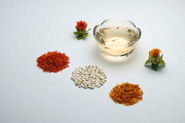 Flowering and saffron flowers eco-friendly. Carthamus tinctorius safflower. Seeds for home garden....