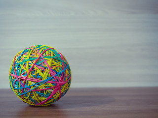 ball from elastics bands for money, as an interior item