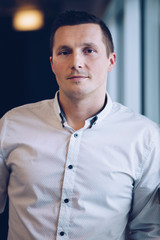 Obraz premium Portrait of a young entrepreneur in office environment.