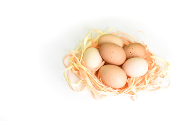 Easter eggs in a basket of willow. chicken eggs