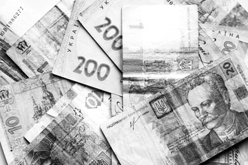 Ukrainian Hryvnia  of different denomination. Money background , black and white photo.