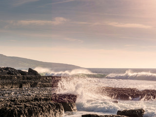 West coast of Ireland, Atlantic ocean waves, Rough stone coastline. County Clare.