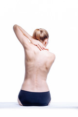 Obraz premium Back of beautiful nude woman on white background