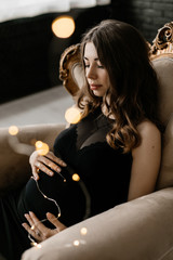 A pregnant woman thinks about her future baby