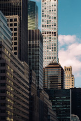 Fototapeta na wymiar Close-up view of 432 Park Avenue Condominiums and modern skyscrapers in Midtown Manhattan New York City