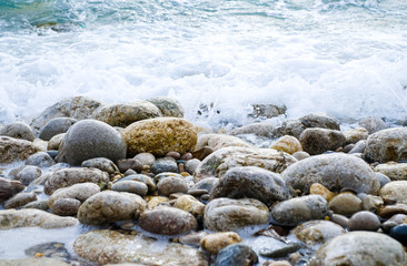 Wet stones on the sea coast
