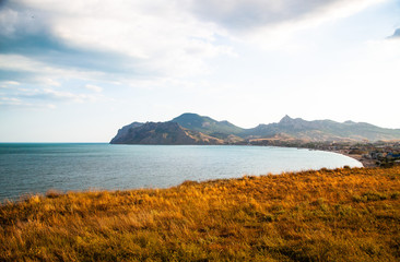 Beautiful seascape at sunset. Sunset in the Bay of Koktebel.