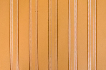 brown fabric with vertical stripes as a background or texture
