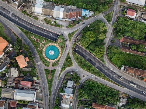 Indonesia, Bali, Denpasar, Aerial view of Patung Dewa Ruci statue at crossroads