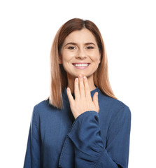 Woman showing THANK YOU gesture in sign language on white background