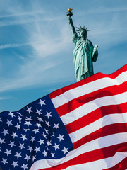 Naklejka premium Double exposure with the American flag and the Statue of liberty. Background for independence day - 4th of July.