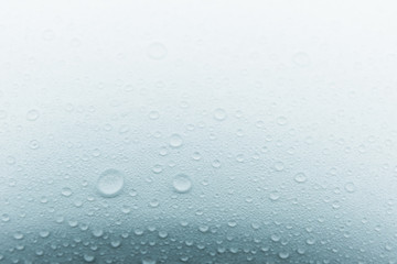 Rain droplets on glass background, Water drops on glass , texture .