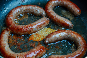 grilled beef sausages with a golden crust