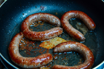 grilled beef sausages with a golden crust