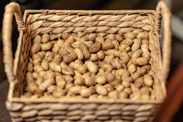The fresh peanuts harvested in the fall are in the paper basket