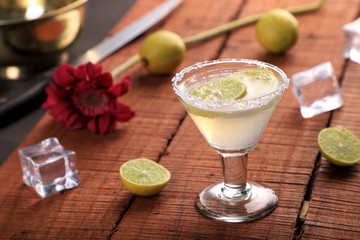 Cold Drink Lemonade in a Glass on a Wooden Background