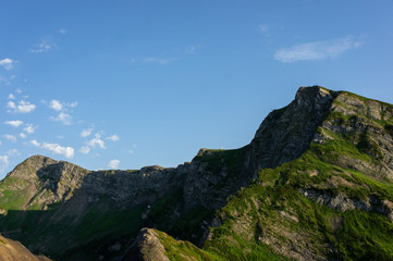 Top view of the mountain range and peaks. Mountain peak in the summer.