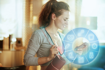 sports woman fitness coaching on internet using smartphone