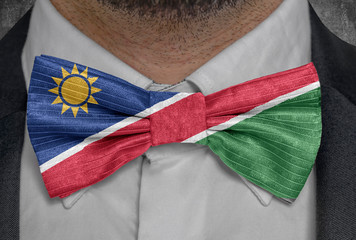National flag of Namibia on bowtie business man suit