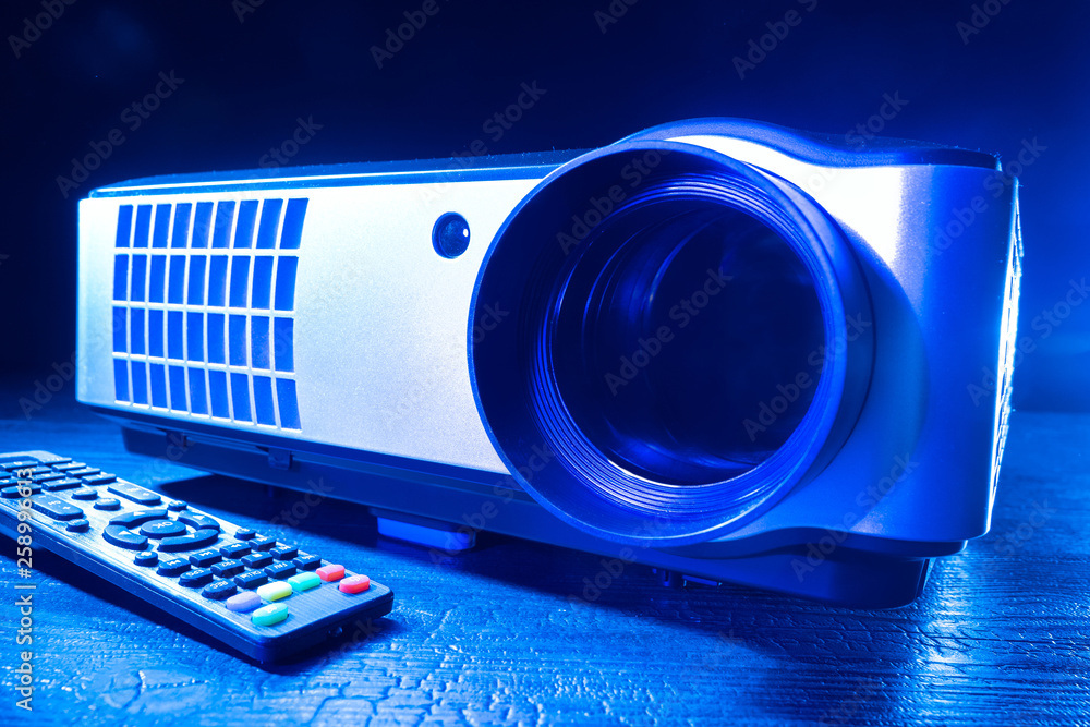 Poster digital video projector with remote control. multimedia projector. equipment for presentations. proj