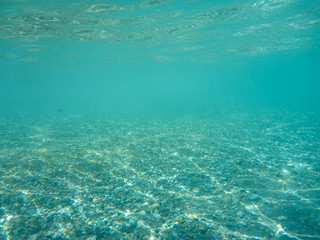 Fototapeta na wymiar Underwater view of the beautiful Skala beach of Kefalonia island, Ionian sea, Greece.