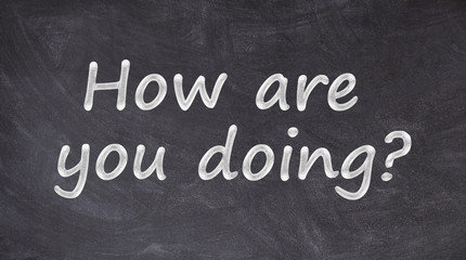 How are you doing written on blackboard
