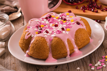 Cake with pink frosting. 