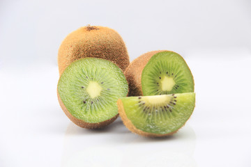 Fototapeta premium part, isolated, green, sweet, kiwi, tropical, food, ripe, vegetarian, fruit, slice, fresh, background, healthy, juicy, cutout, brown, half, color, white, tasty, closeup, group, whole, freshness, piece