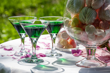 wedding candy bar with drinks outdoors