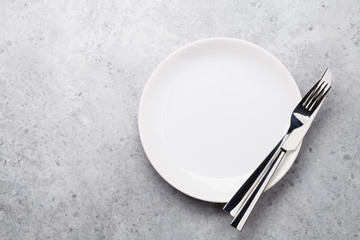Empty plate with cutlery