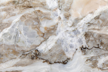 Close up of light brown marble texture. High resolution photo.