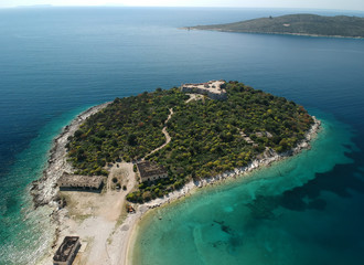 Porto Palermo Castle on island with beautiful Mediterranean water adriatic sea in Himara, Albania coast.