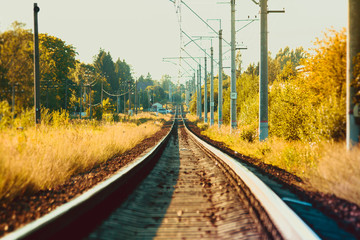 Fototapeta na wymiar Rails of the Russian railway at sunset. Railway. Rails