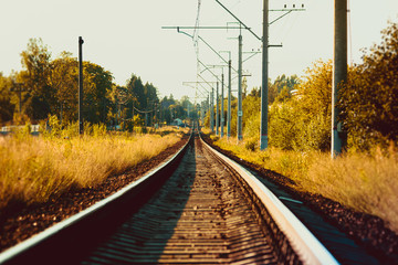Obraz na płótnie Canvas Rails of the Russian railway at sunset. Railway. Rails