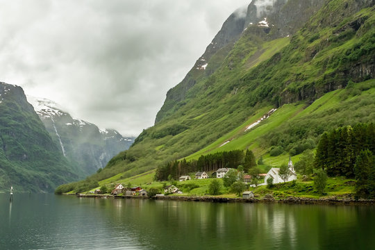 Hamlet - The tiny village of Bakka hangs onto the side of the N&aelig;r&oslash;yfjord. Norway