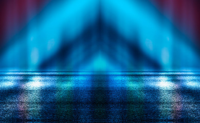 Dark empty stage, multicolored rays of neon searchlight, wet asphalt, smoke, night shooting, bokeh...