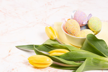 Beautiful easter background with fresh yellow tulips