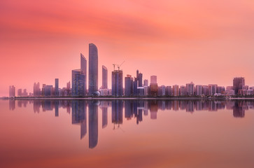 Fototapeta na wymiar View of Abu Dhabi Skyline on a sunny day, UAE