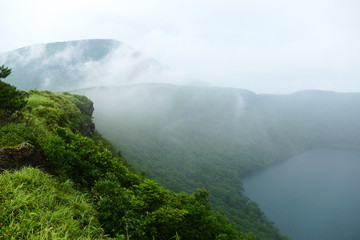 Onami Ike emerging from the fog, Ebino kogen, Kyushu, Japan