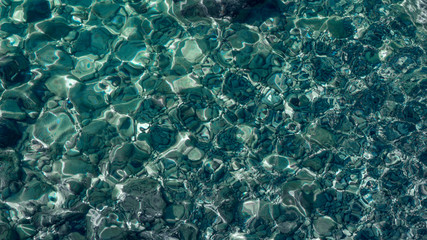 Shining blue water ripple background