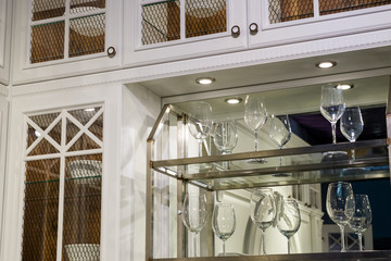 Element of furniture cabinet with glassware in the cabinet