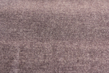 Grey fabric texture background of smooth cotton cloth surface. Material design of seamless woven pattern, empty old textured gray backdrop. Blank canvas and copy space template with selective focus